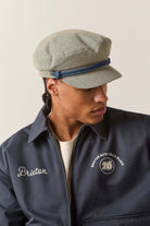 Unisex 76 Fiddler Fisherman Cap in the color Navy/Off White Hickory Stripe - Men's Side View