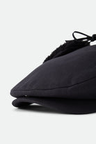 Unisex Barrel Earflap Snap Cap in the color Black/Black - Additional Laydown image